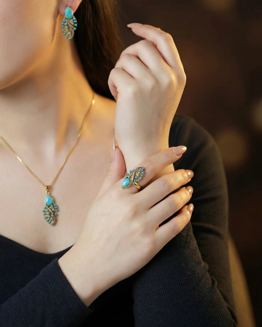 Elegant Midnight Wing Jewellery Set by Jewel by JF featuring intricate silver earrings and matching necklace with feather-inspired design.