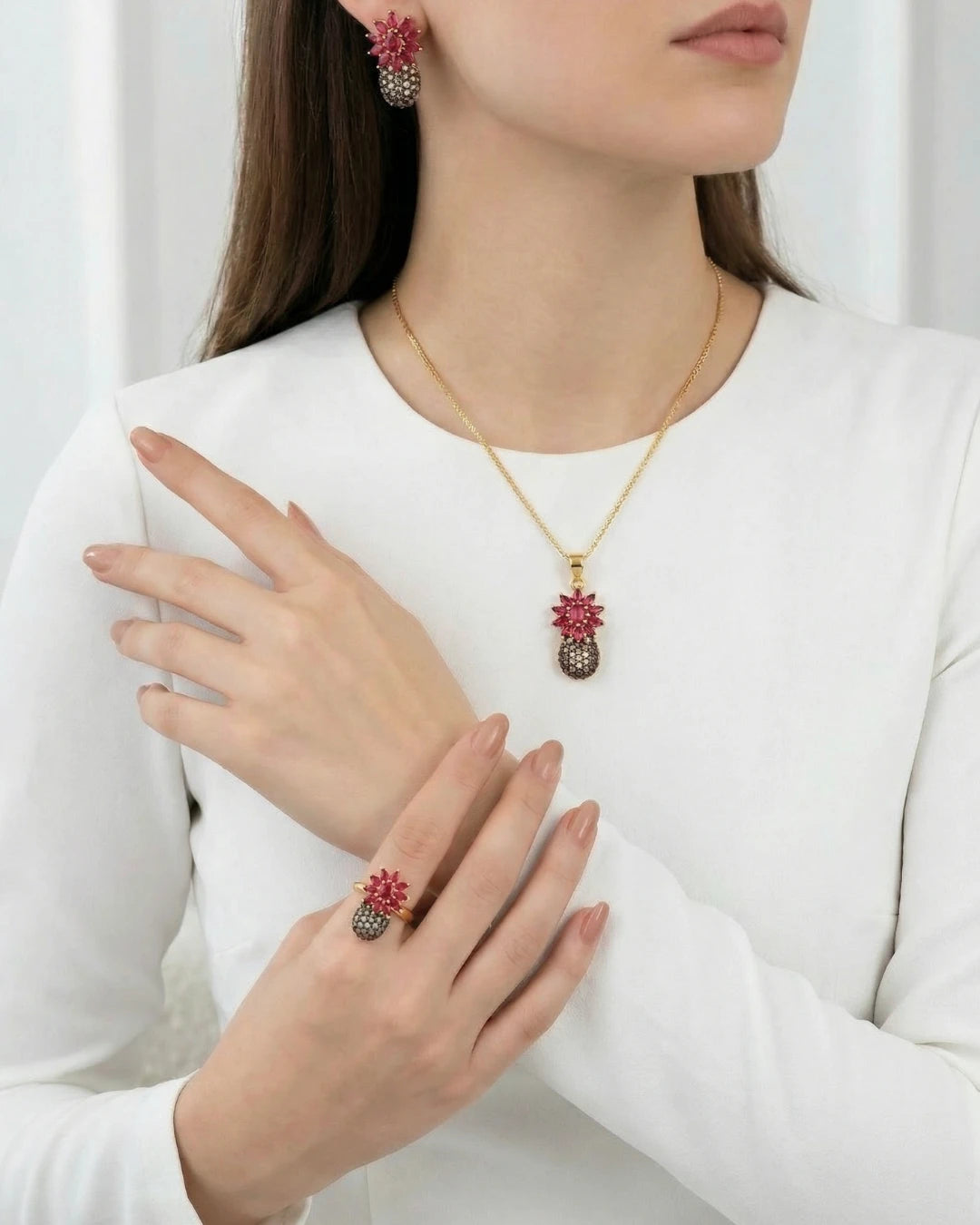 Kaleidoscope Pineapple jewelry set by Jewel by JF featuring colorful pineapple-shaped earrings and necklace on a white background.