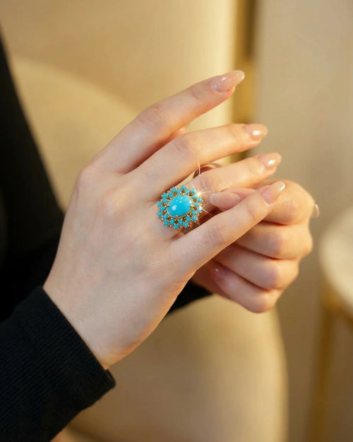 Azure Sunburst Statement Ring by Jewel by JF featuring a vibrant sunburst design with intricate silver detailing.
