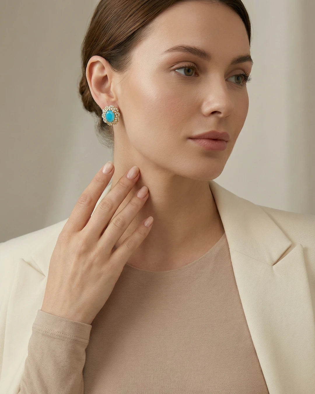 Azure Petal Stud Earrings by Jewel by JF featuring delicate petal-shaped silver studs on a white background.