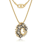 Gold Garland Pendant Necklace by Jewel by JF featuring intricate chain design and a decorative pendant.