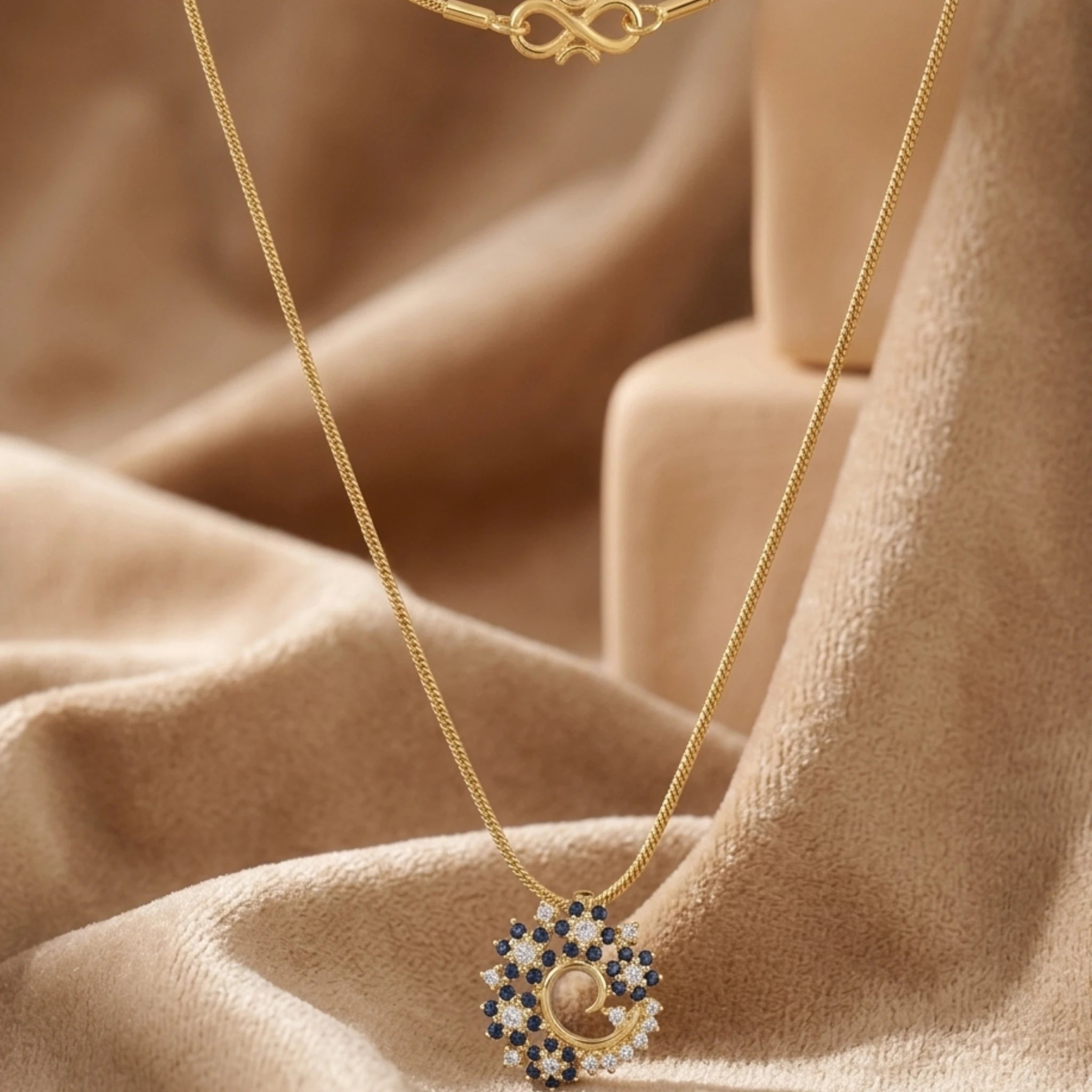 Gold Garland Pendant Necklace by Jewel by JF featuring a delicate chain with a floral-inspired pendant design.