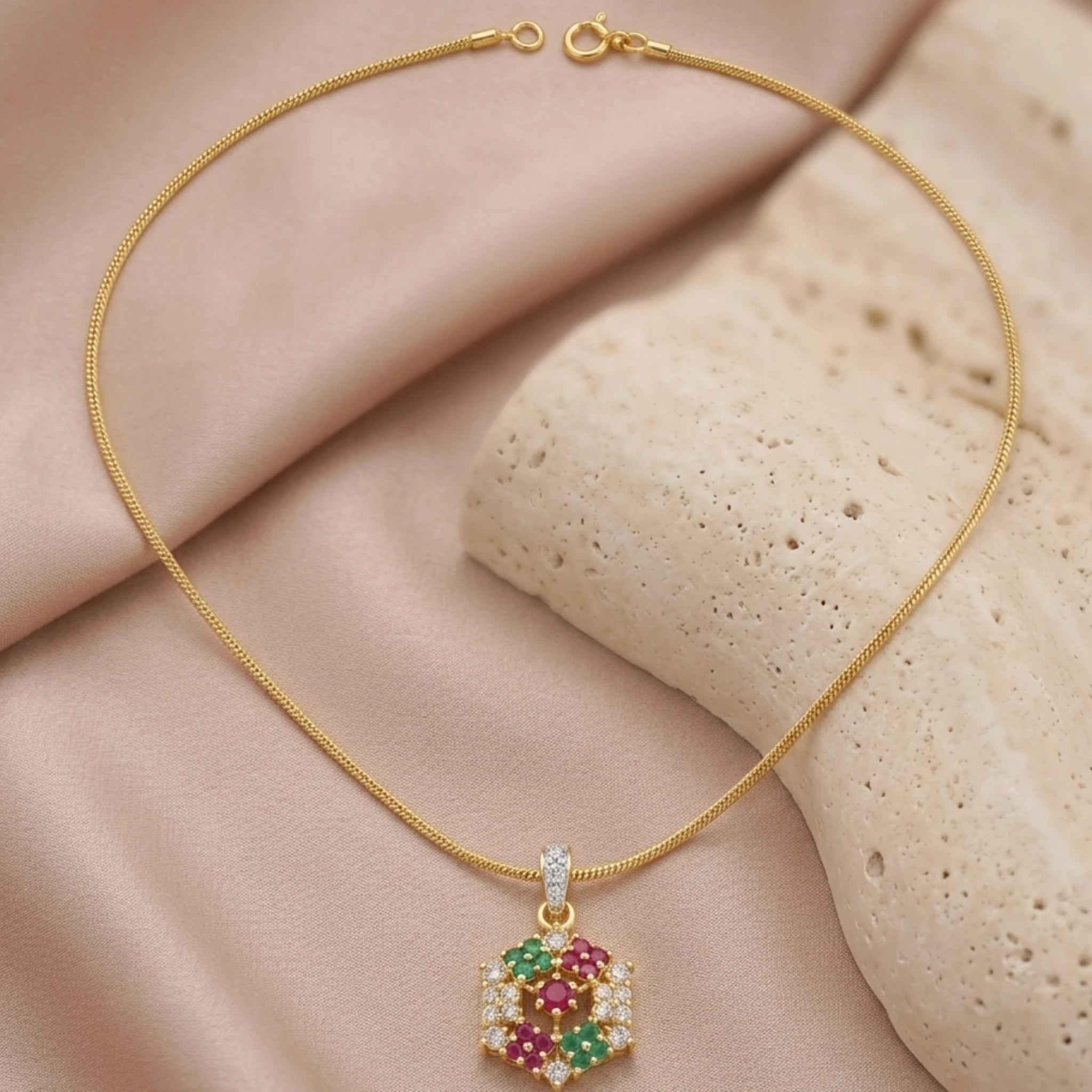 Heritage Mosaic Pendant Necklace by Jewel by JF featuring a colorful mosaic design on a silver chain.