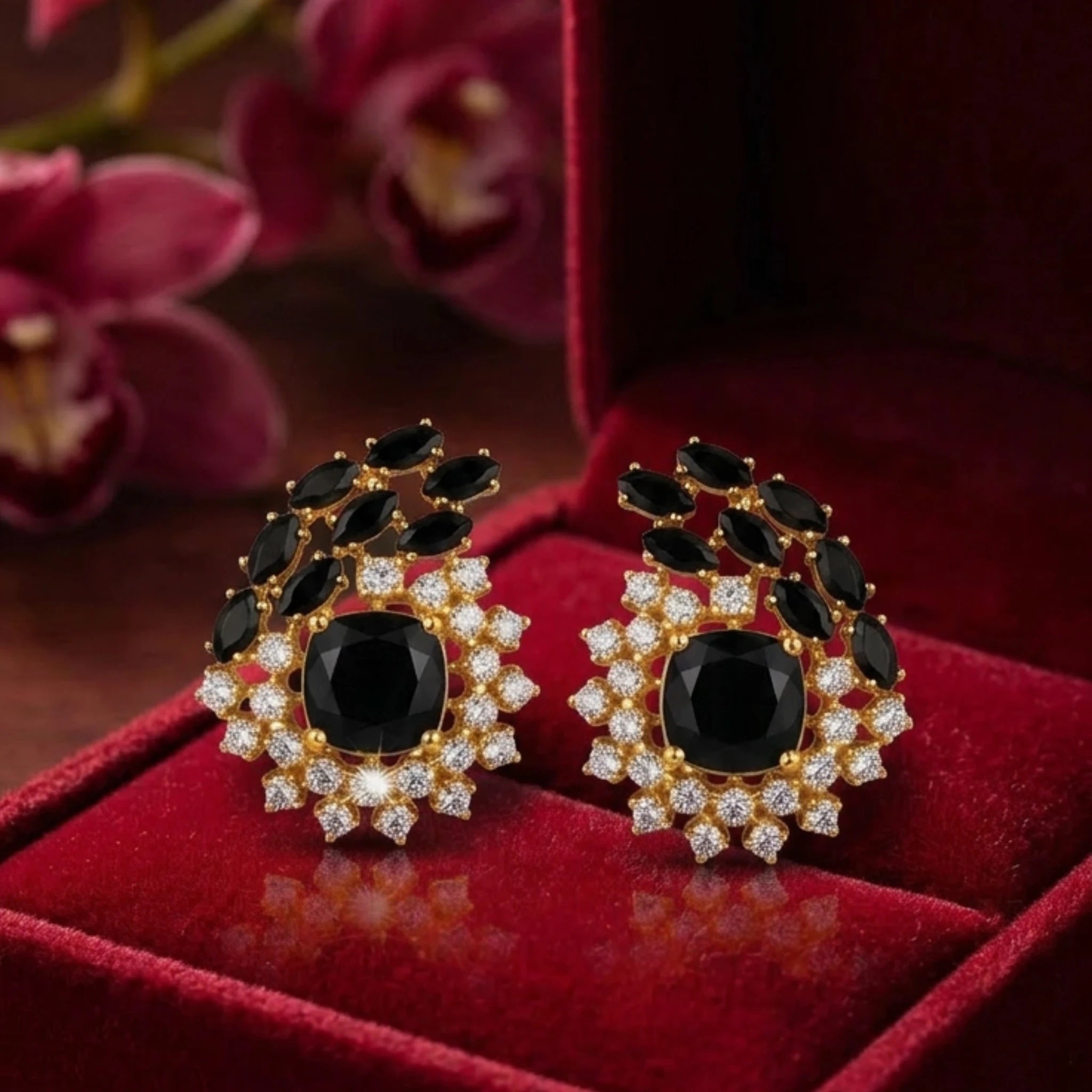 Onyx statement earrings by Jewel by JF featuring bold black onyx stones and sleek silver studs.