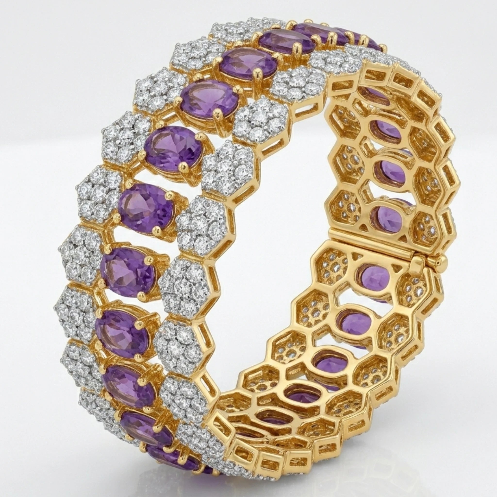 Jewel by JF Royal Honeycomb statement bracelet featuring a gold honeycomb design and bold, textured metal links.
