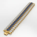 Gold Royal Honeycomb Statement Bracelet by Jewel by JF featuring a bold honeycomb design and intricate detailing.