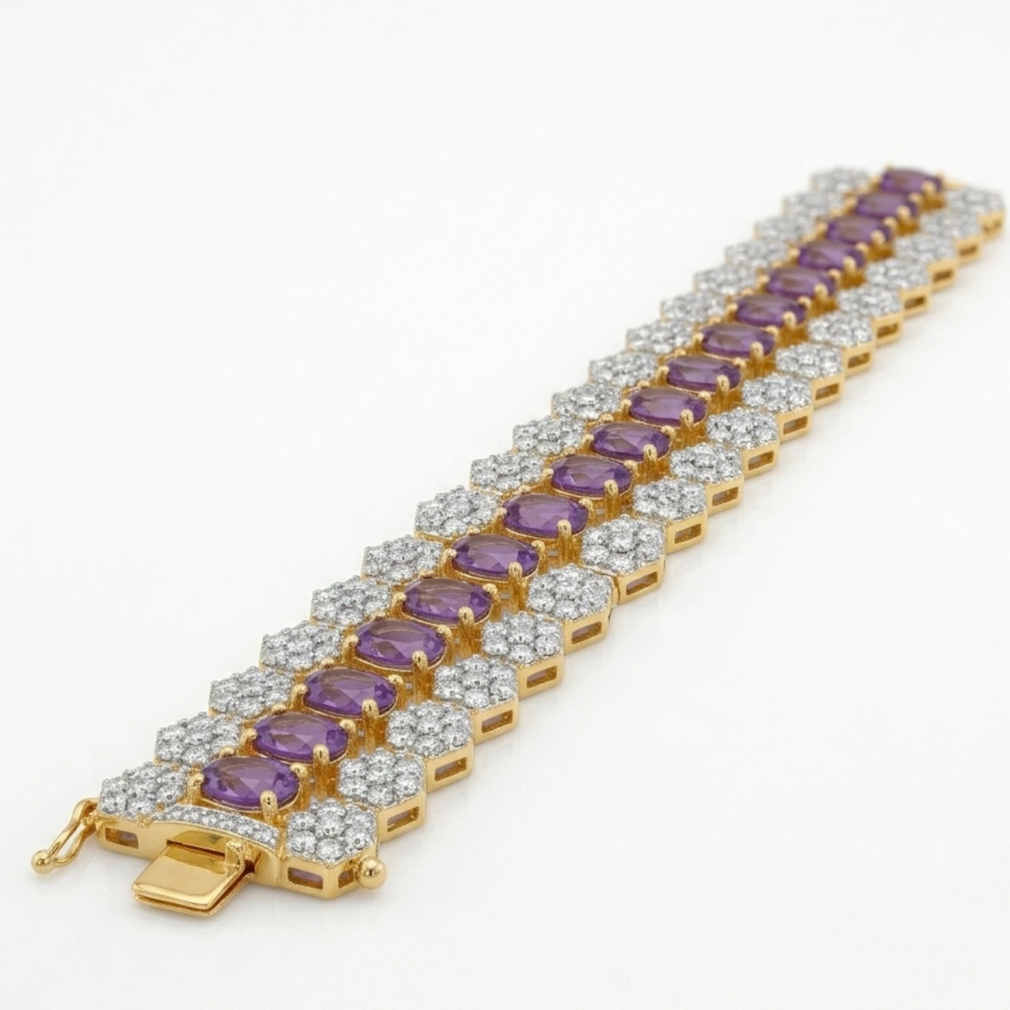 Jewel by JF Royal Honeycomb Statement Bracelet featuring gold honeycomb design and bold, intricate metalwork.