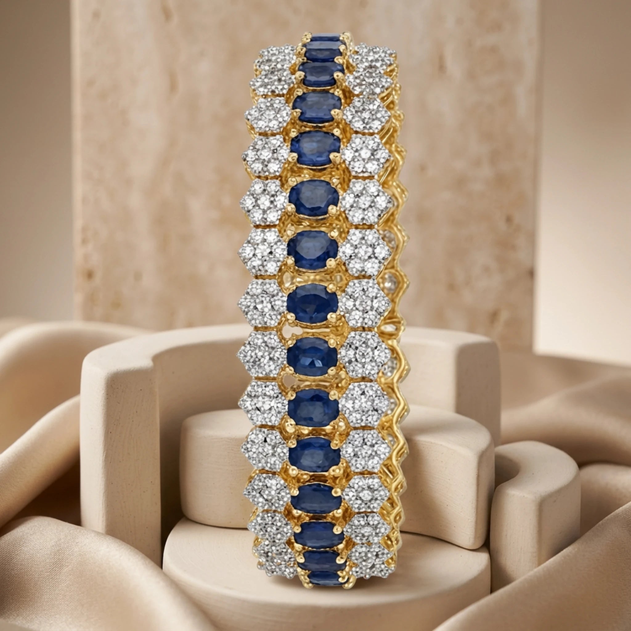 Jewel by JF royal honeycomb statement bracelet featuring gold-tone honeycomb design and bold, elegant jewelry style.