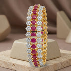 Jewel by JF Royal Honeycomb statement bracelet featuring gold honeycomb design and bold, intricate metalwork.