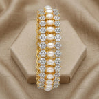 Jewel by JF Royal Honeycomb statement bracelet with gold honeycomb design and bold, intricate metalwork.