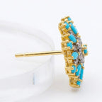 Starburst earrings by Jewel by JF featuring shiny, intricate starburst design, crafted for elegant jewelry style.