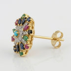 Gold starburst earrings by Jewel by JF featuring radiant, sunburst design with intricate details on silver earrings.