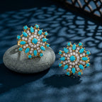 Starburst earrings by Jewel by JF featuring sparkling gold-tone designs with radiant, star-shaped accents.