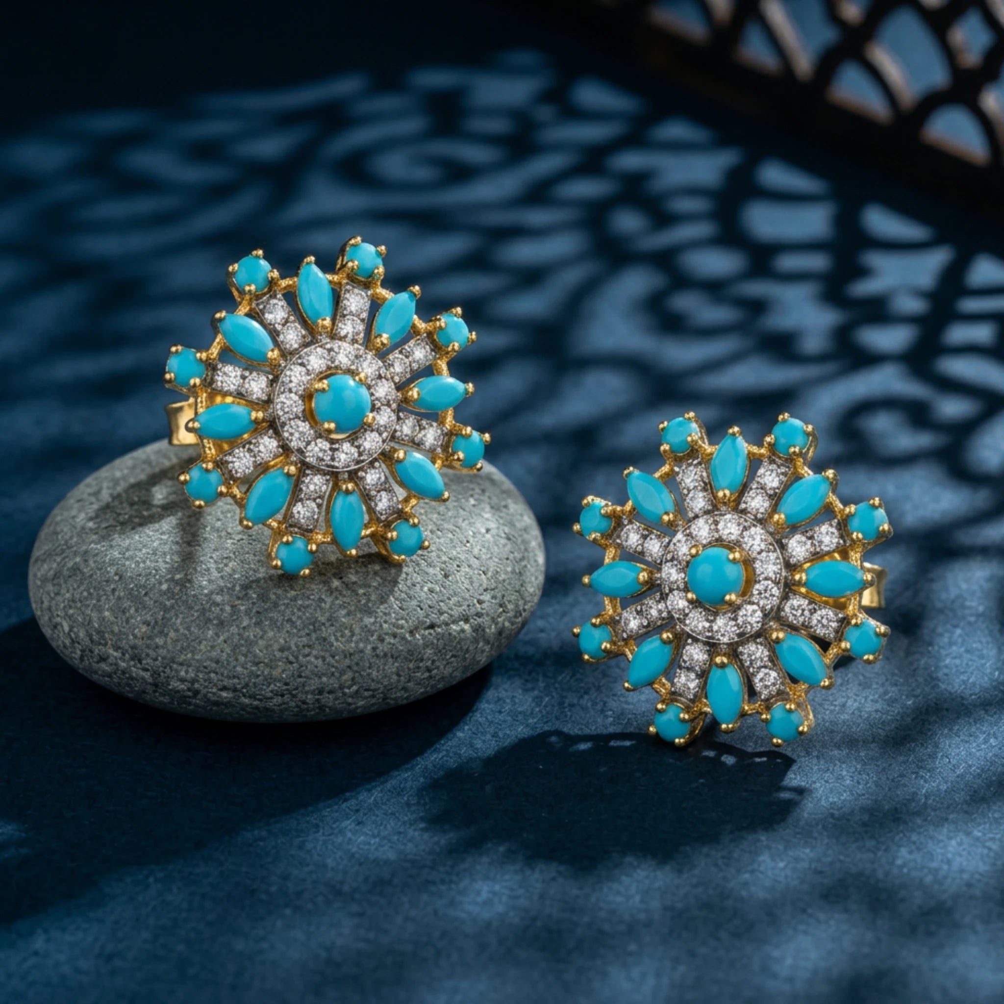 Starburst earrings by Jewel by JF featuring sparkling gold-tone designs with radiant, star-shaped accents.