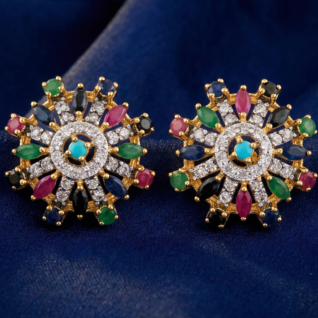Starburst earrings by Jewel by JF featuring a radiant, star-shaped design with sparkling accents in gold and silver tones.
